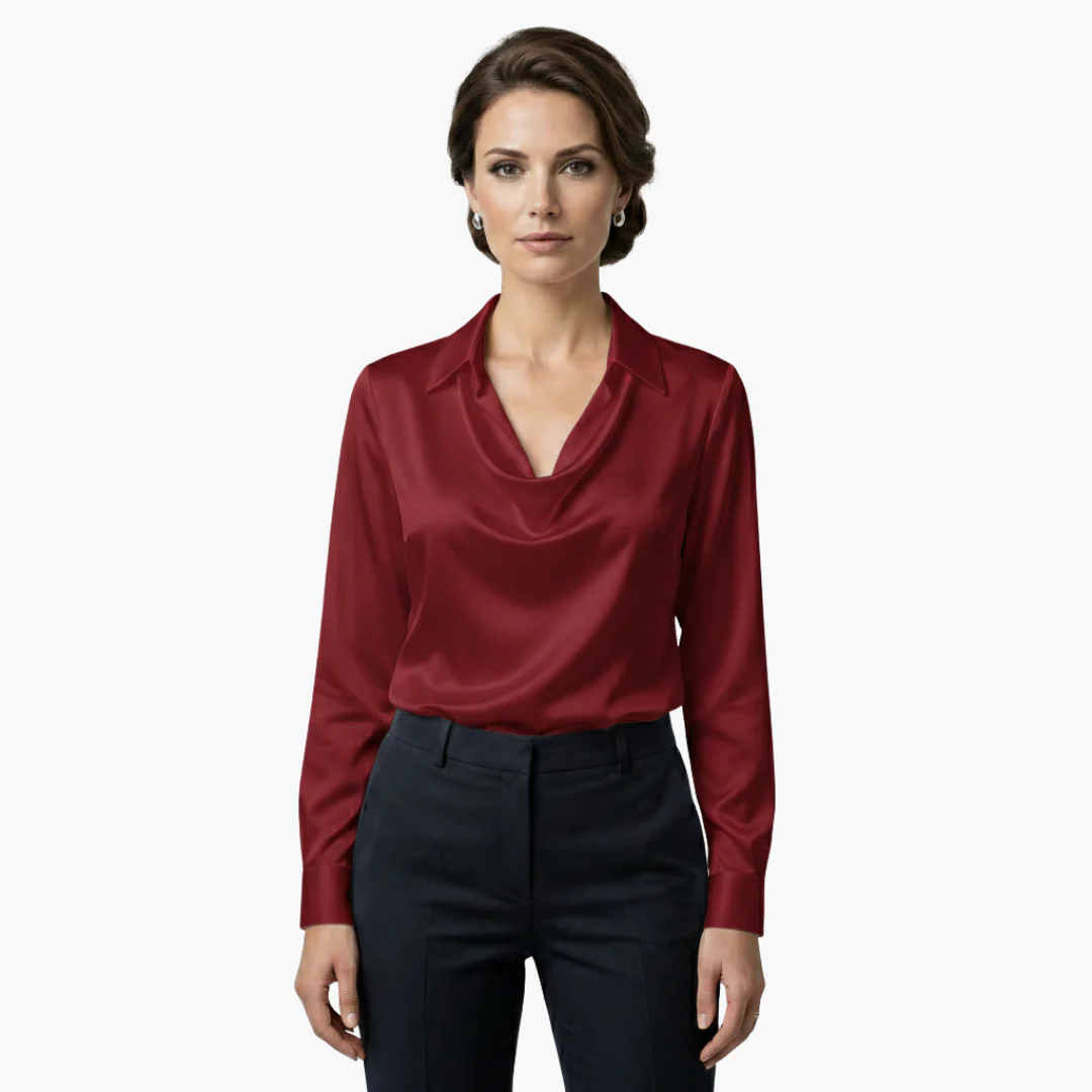 Women's satin blouse with draped neck and long sleeves.