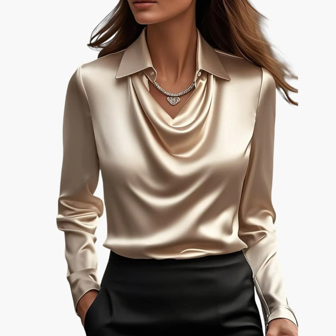 Women's satin blouse with draped neck and long sleeves.