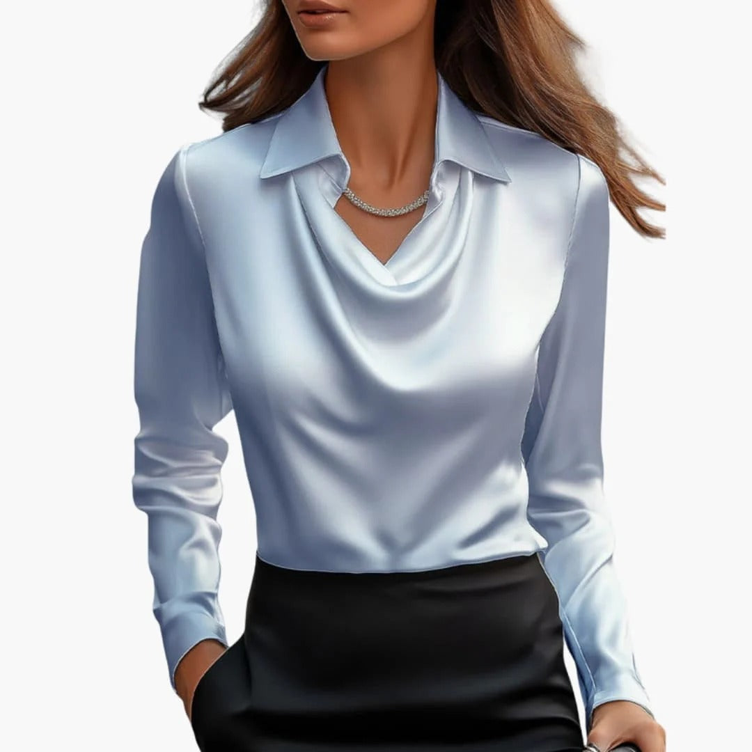 Women's satin blouse with draped neck and long sleeves.