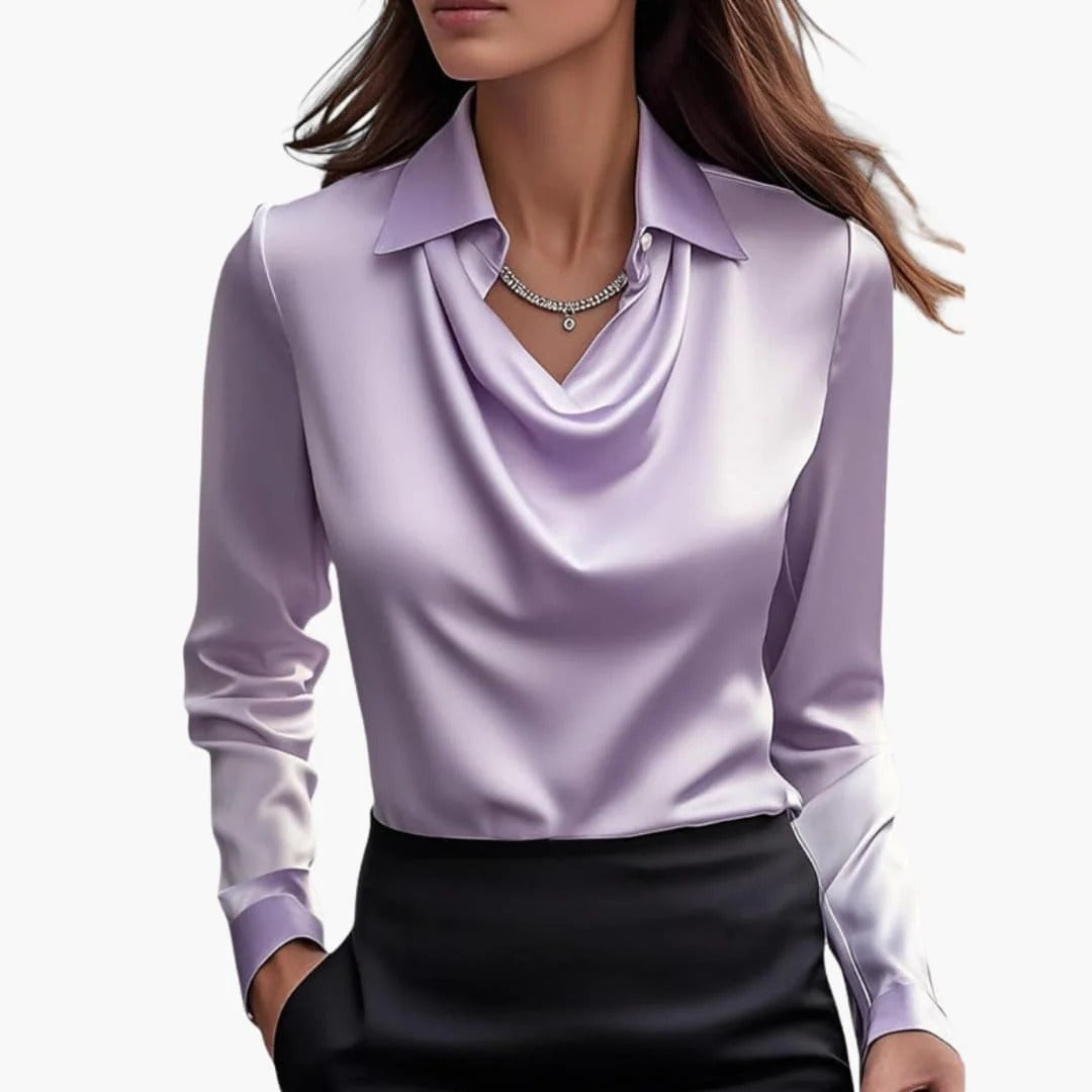 Women's satin blouse with draped neck and long sleeves.