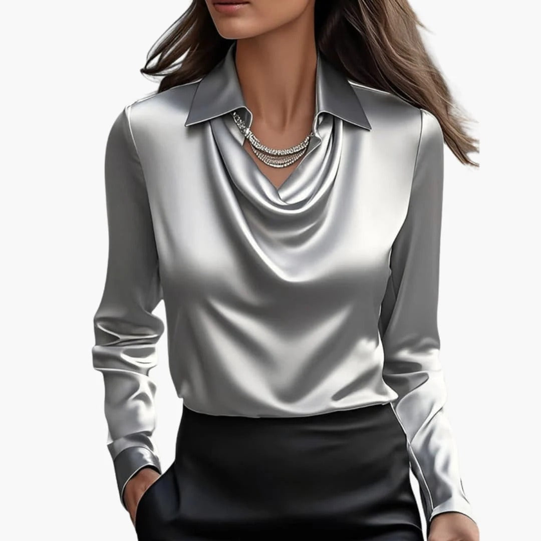 Women's satin blouse with draped neck and long sleeves.