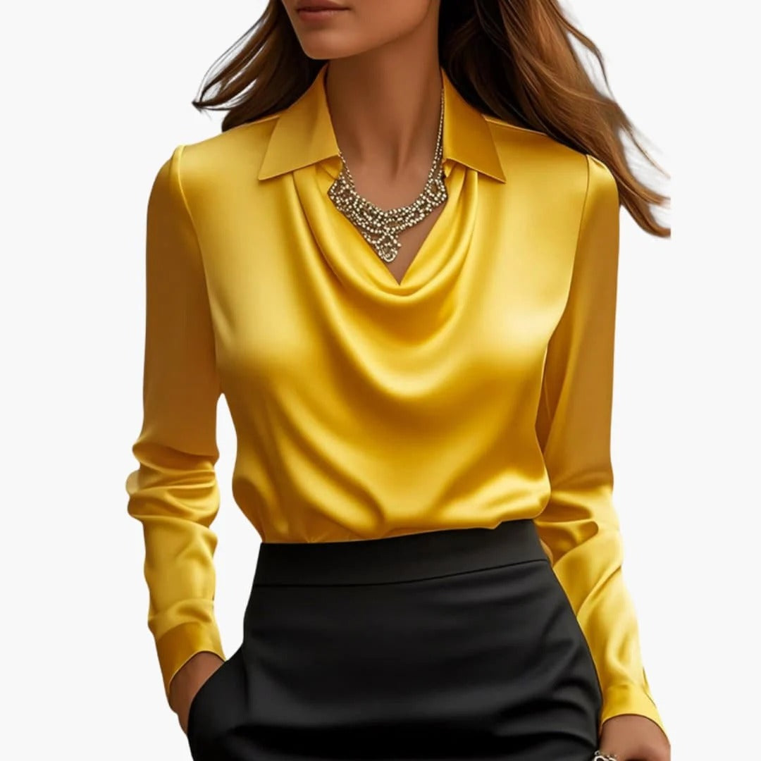Women's satin blouse with draped neck and long sleeves.