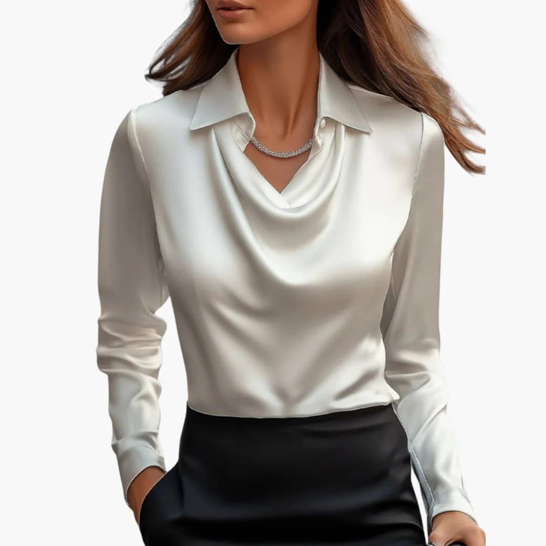 Women's satin blouse with draped neck and long sleeves.