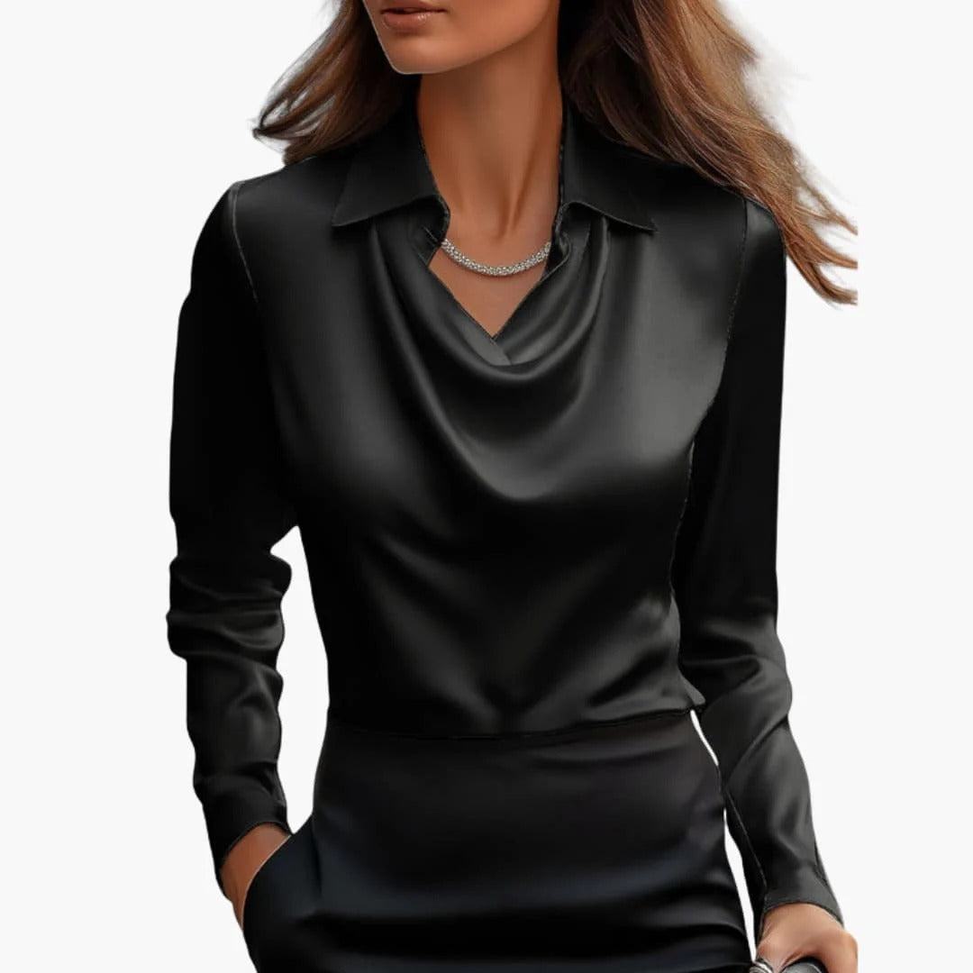 Women's satin blouse with draped neck and long sleeves.